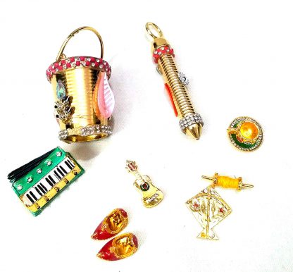 Laddu Gopal harmonium, pichkari, charan paduka and more toys